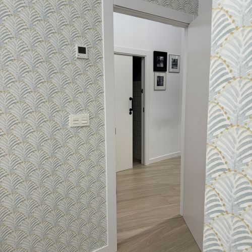 Transición visual con decoración en tonos verdes que evocan nuestra identidad